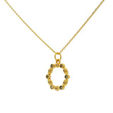 Gold necklace with eye circle pendant, stones and zircons