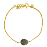Gold bracelet and natural stones