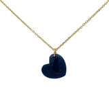 Golden necklace with large heart stone pendant