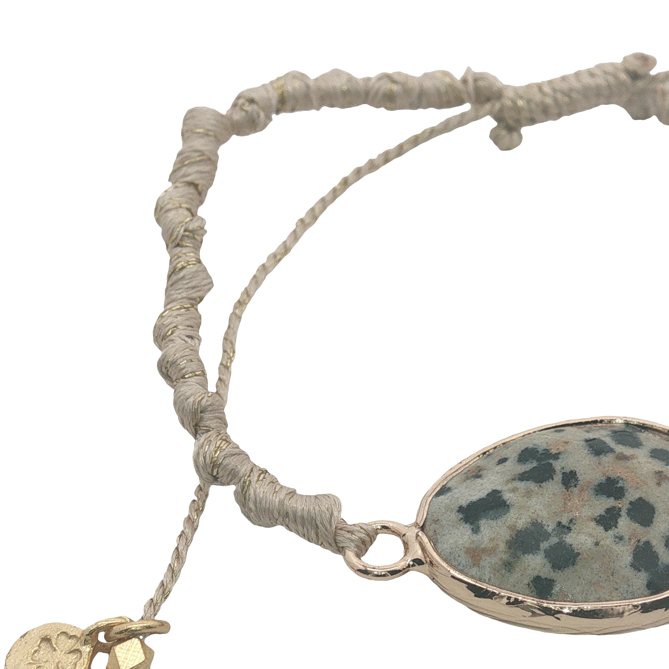 Bracelet cordon beige avec jaspe dalmatien cerclé de doré