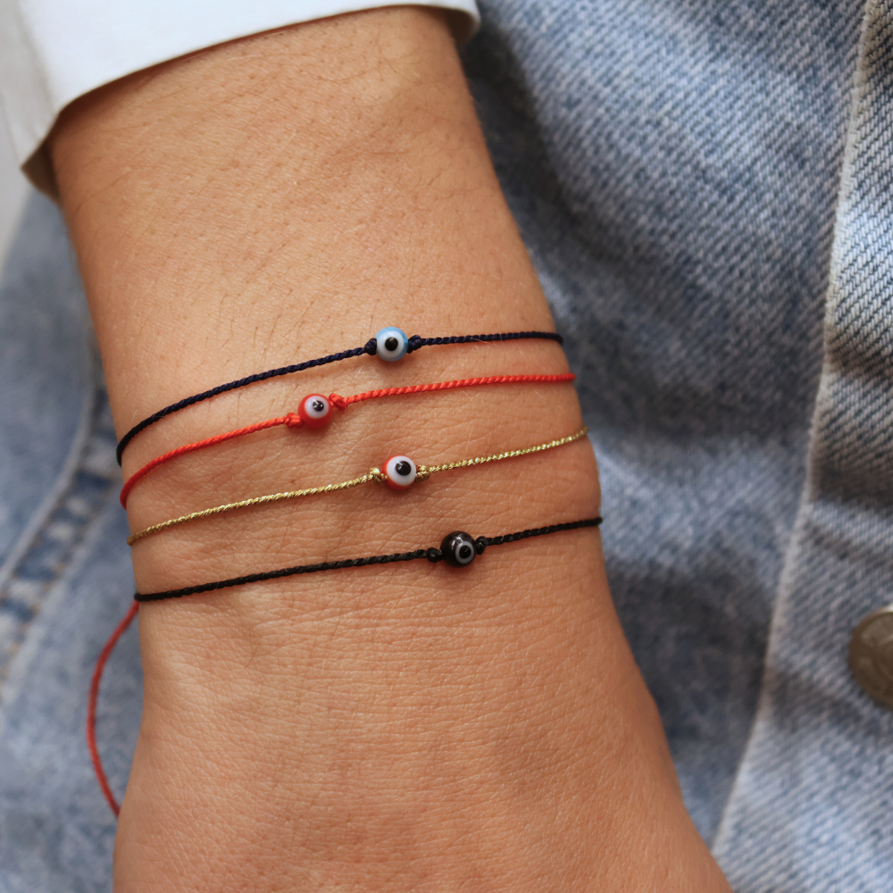 Fine colored thread bracelet and lucky eye