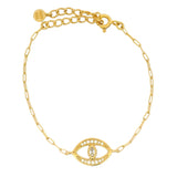 Golden bracelet with lucky eye, stone and zircons