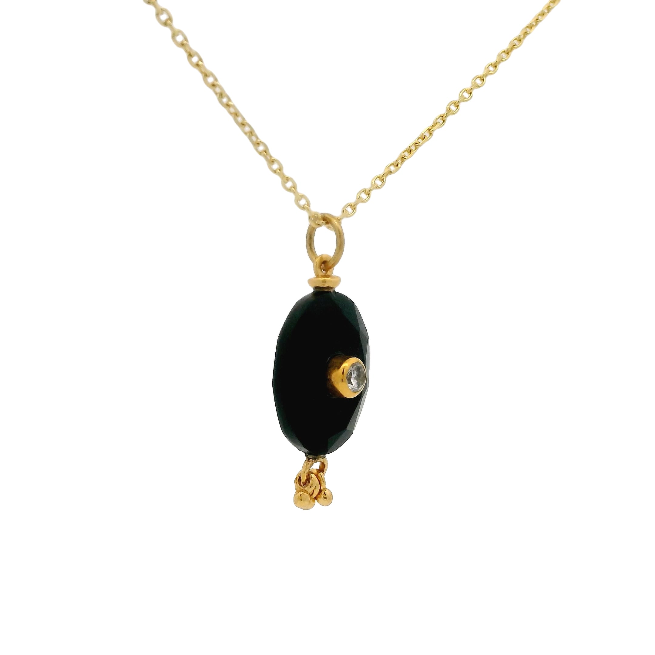 Gold necklace with unset stone, tassels and zircon