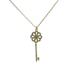 Collier doré clé et fleur en zircons 50 cm