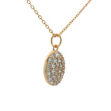Gold necklace with oval zircon medal
