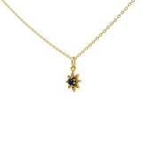 Gold necklace with star pendant, stone and zircons