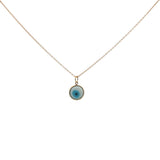 Gold necklace and flat eye