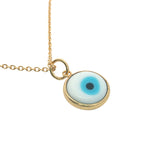 Gold necklace and flat eye