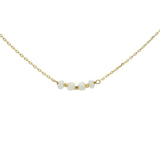 Golden necklace with natural stones and golden pearls