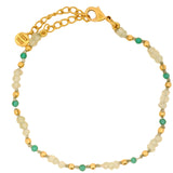 Bracelet with green onyx and faceted prehnite and golden balls