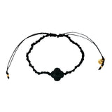 Bracelet doré sur cordon noir trèfle en onyx noire facettée