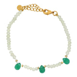 Golden bracelet with faceted stones and drops