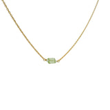 Golden necklace with rectangular stone and small faceted stones