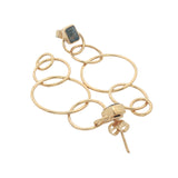 Golden earrings and square stone