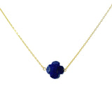 Gold clover necklace with faceted stone