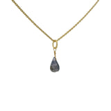 Gold necklace and faceted drop stone