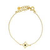 Gold bracelet with hollow flower and zircon