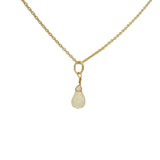 Gold necklace and faceted drop stone