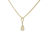 Gold necklace and faceted drop stone