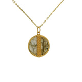 Gold necklace with stone medal