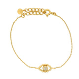Openwork eye bracelet with stone and zircons