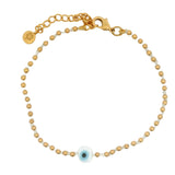 Bracelet doré oeil blanc noeuds et boules dorées