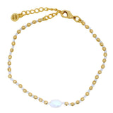 Gold guilloche bracelet with mother-of-pearl eye