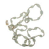 Collier doré prehnite, améthyste, perles dorées et noeuds verts