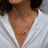 Necklace with golden pearls and stones