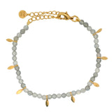 Bracelet with stones and gold tassels