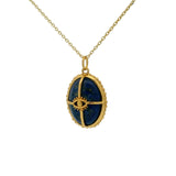 Collier doré cabochon pierre lapis , cage dorée et oeil 42 cm
