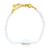 Bracelet doré perles de culture irrégulières cauri naturel