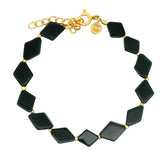 Gold bracelet with diamond-shaped stones