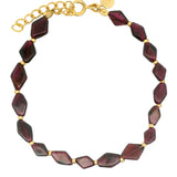 Gold bracelet with diamond-shaped stones