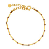 Bracelet tubes dorés et goldstone