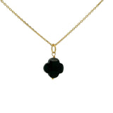 Gold necklace and stone clover