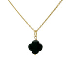 Gold necklace and stone clover
