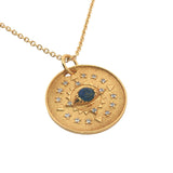 Gold necklace with eye stone and zircon medal