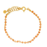 Gold bracelet and faceted natural stones