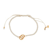 Bracelet cordon crème menottes dorées