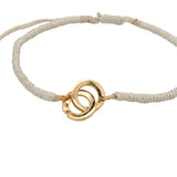 Bracelet cordon crème menottes dorées