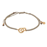 Bracelet cordon beige menottes dorées