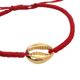 Red cord and gold cowrie bracelet