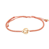 Bracelet cordon orange menottes dorées