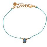 Bracelet cordon et pampille pierre