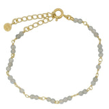 Gold bracelet with small stones