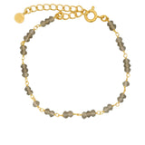 Gold bracelet with small stones