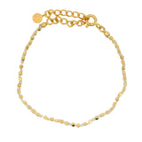 Gold bracelet and cord knot