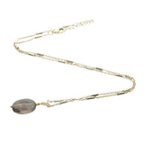 Collier doré quartz fumé ovale facetté 42 cm