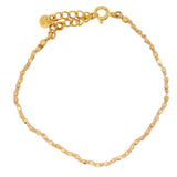 Bracelet doré avec perles martelées dorées et noeuds corail
